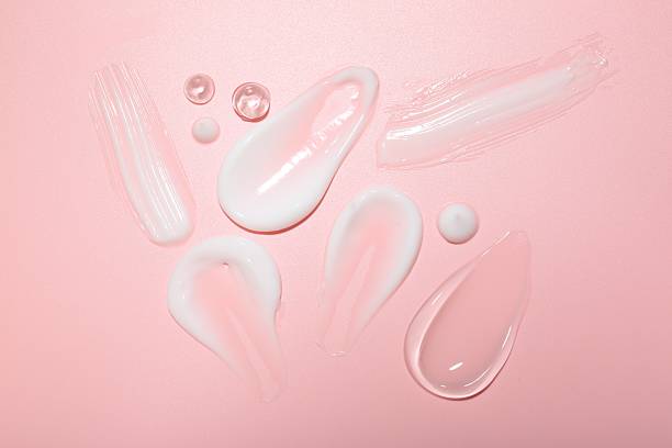 istock Cream and gel samples on pink background, top view 2215182541