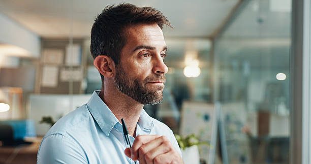 istock Business, thinking and man in office, stress and problem solving with planning, pressure and review. Deadline, copywriting and journalist with ideas, thoughtful and solution with doubt for proposal 2215183765