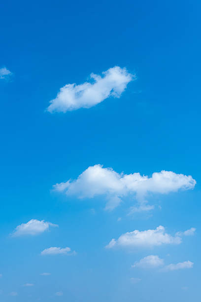 istock Vibrant Blue Sky with Scattered Fluffy Cumulus Clouds Sunny Day Atmosphere 2215183957