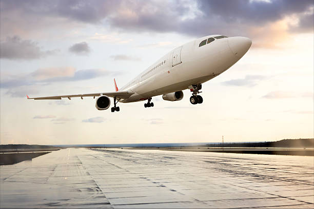 istock Passenger airplane Take off at sunset 2215185798