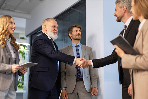 istock Businessmen shaking hands during a meeting. 2215191779