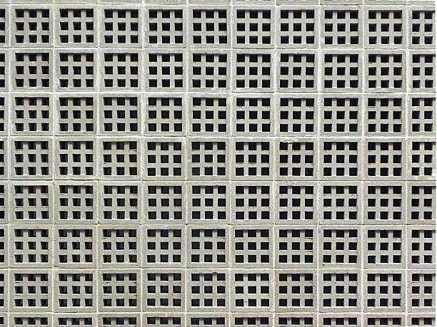 Concrete walls with a boxy and perforated design, function for air ventilation, usually built in cafes or industrial houses.