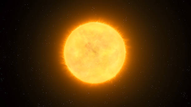 istock Bright sun-like star in space. Yellow star on black background. 2215199821