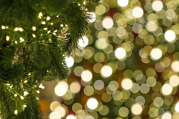 istock Merry christmas tree with bokeh lights, xmas holiday background. 2215201958