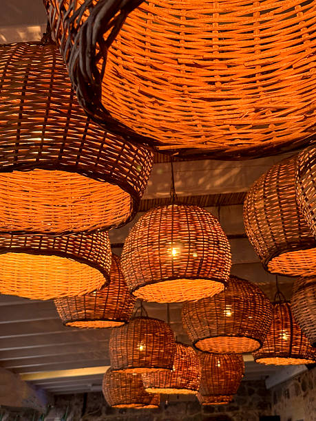 istock Wicker lamps in a bar or restaurant at night 2215202951