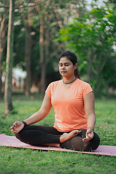 istock Mindfulness and Yoga Practice in the Park 2215209155