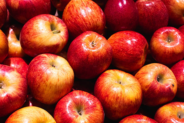 istock A background and close-up of fresh, shiny red apples 2215209369