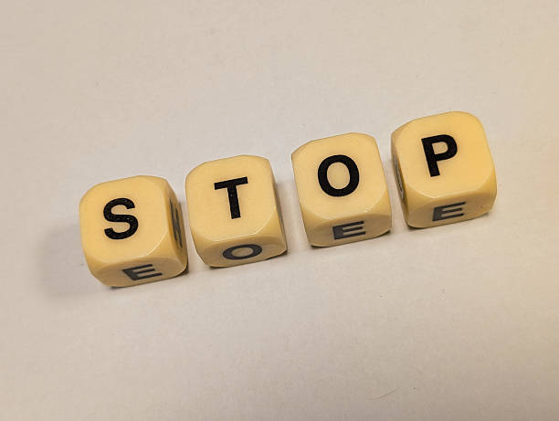 istock word “stop” made of toy letter cubes 2215210726