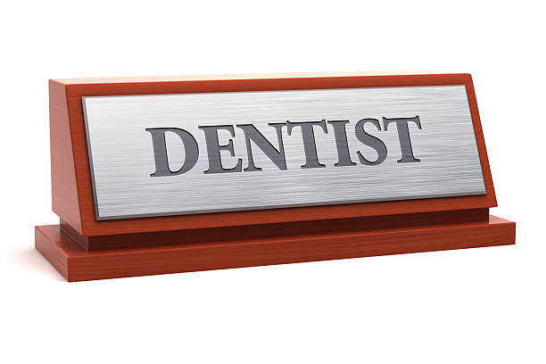istock Dentist job title on nameplate 2215211417