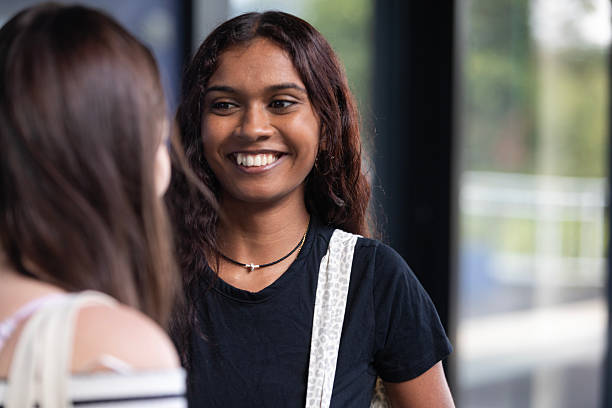 istock Young Australian  woman talking while out shopping 2215216758