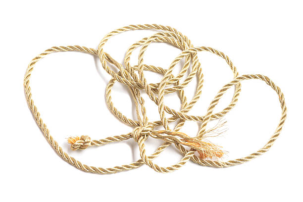 istock Golden rope isolated on a white background 2215217341