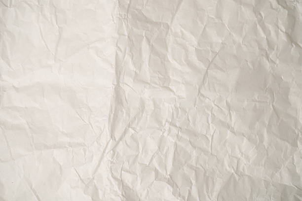 Crumpled paper grunge background texture.