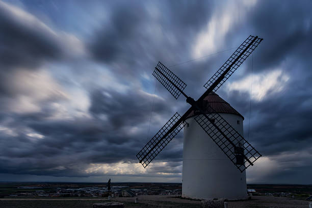 Storms over the Mills in Mota del Cuervo, Cuenca, Castilla la Mancha, Spain. Clouds in escape in long exposure.