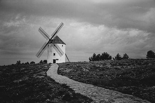 Black and white photograph of windmills in Mota del Cuervo, Cuenca, Castilla la Mancha, Spain.