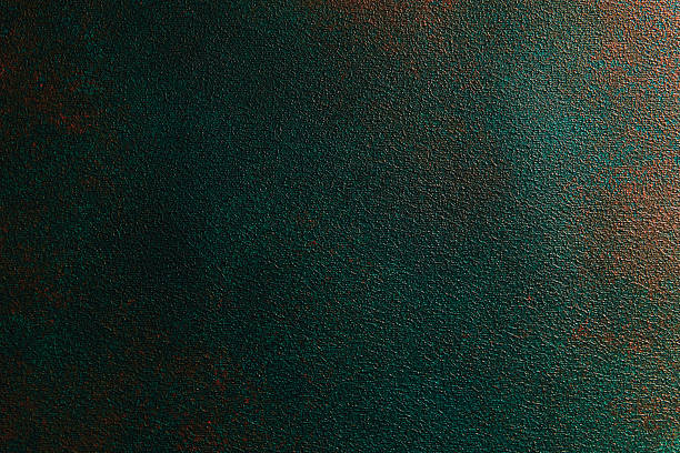 istock Textured surface with deep green and bronze tones creating an abstract background 2215228421