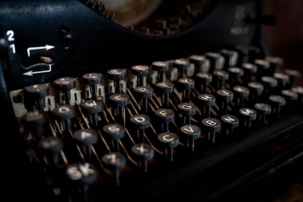 istock Classic Black  Typewriter with Retro Keys and Carriage, Showcasing Timeless Design and Vintage Office Equipment Appeal 2215232368