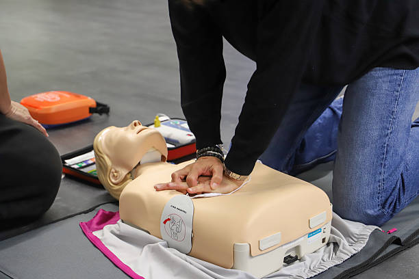 istock first aid course - company safety - cardiac massage - Basic Life Support 2215232412