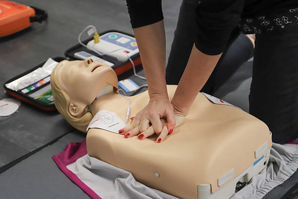 istock first aid course - company safety - cardiac massage - Basic Life Support 2215232988