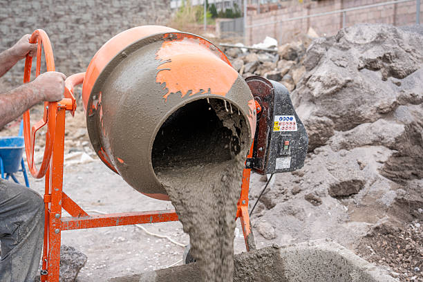 istock Preparation of concrete mix in a concrete mixer 2215235607