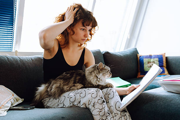 istock young woman spending time with her cat 2215235962