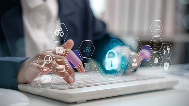 istock Businessmen typing on keyboard with virtual icons of cybersecurity and two-factor authentication 2FA. 2215235971