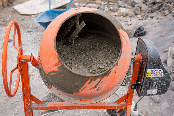 istock Preparation of concrete mix in a concrete mixer 2215236220