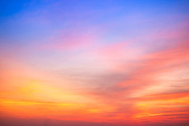 istock Beautiful , luxury soft gradient orange gold clouds and sunlight on the blue sky perfect for the background, take in evening,Twilight, Large size, high definition landscape photo 2215236911