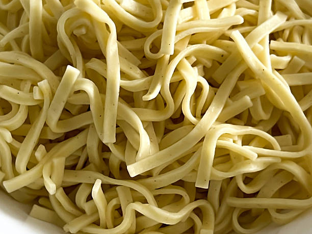 istock Cooked pasta, prepared on a plate to be covered with broth 2215239879