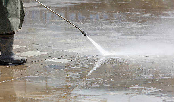 istock A hose is spraying water on a sidewalk 2215241073
