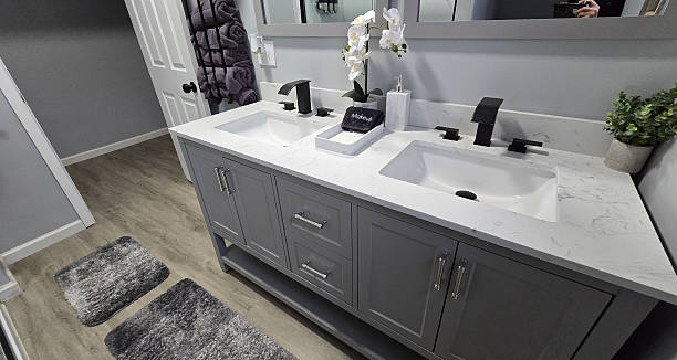 istock Modern Bathroom Interior Design, Clean and simple bathroom interior showcasing a functional bathtub, modern sink, and neatly arranged amenities for a refreshing and inviting atmosphere 2215241887