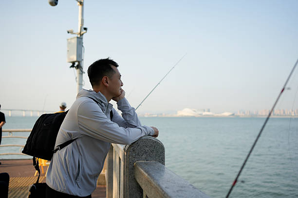 A man enjoying the scenery by the seaside