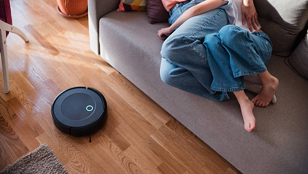 istock Cleaning concept - automatic robotic Vacuum clean the room 2215252651