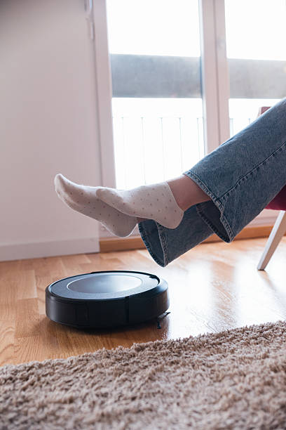 istock Cleaning concept - automatic robotic Vacuum clean the room 2215253961