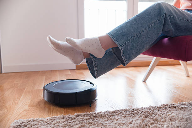 istock Cleaning concept - automatic robotic Vacuum clean the room 2215253974