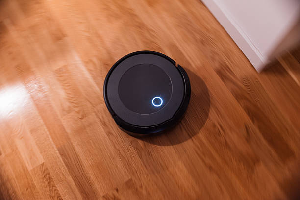 istock Robot vacuum cleaner in action 2215254988