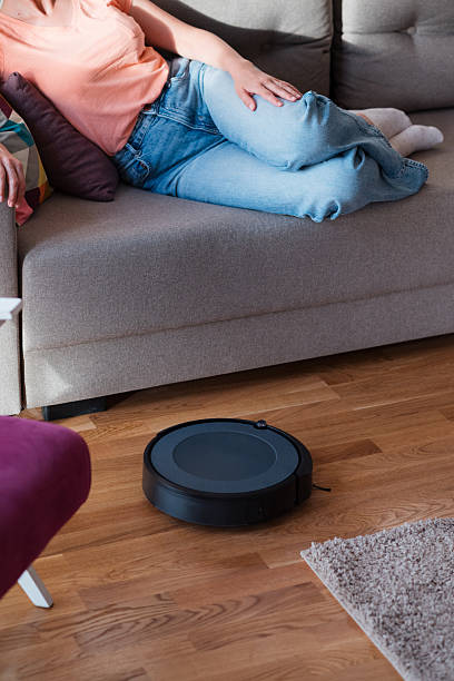 istock Cleaning concept - automatic robotic Vacuum clean the room 2215255389