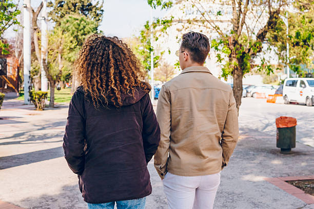 istock A couple walking through the city 2215258065