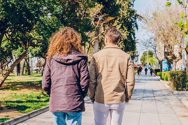 istock A couple walking through the city 2215258264