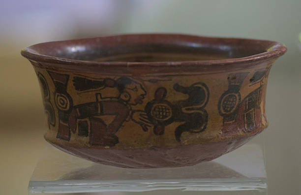 istock Mayan relic with written glyphs 2215263639