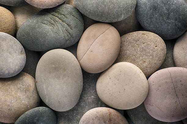 istock Pebbles. A background of sea stones. 2215265804
