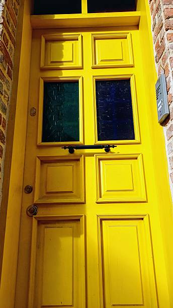 istock Yellow wooden door 2215266003