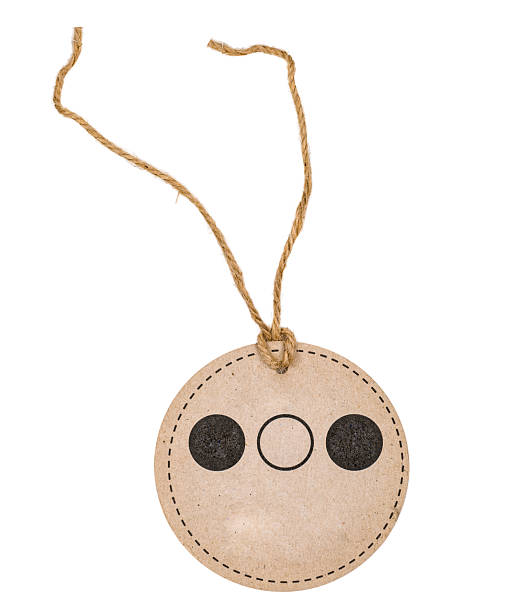 istock Round Kraft Paper Tag with Stylized Face and Jute String 2215266175