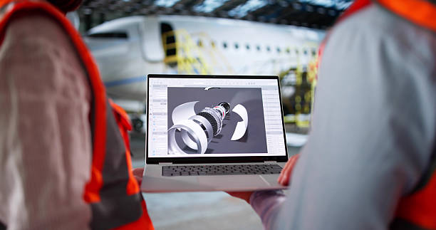 istock Aircraft Technician Inspects Airplane Engine During Snowstorm 2215268350