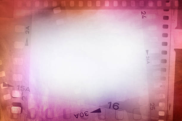 A close-up image of a vintage filmstrip with several blank frames, showcasing textures and the nostalgic feel of analog photography.