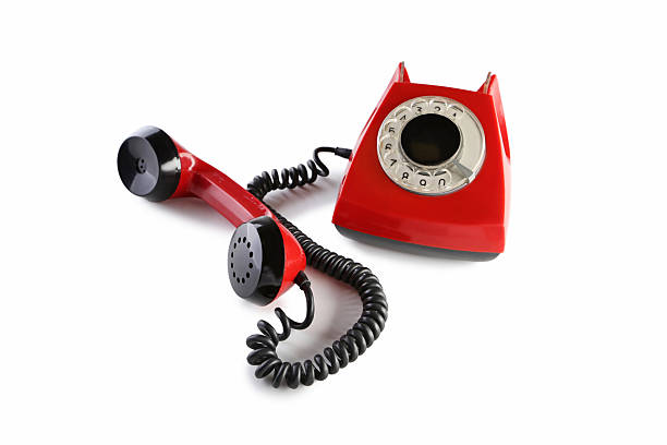 istock Red retro telephone isolated on a white 2215272529