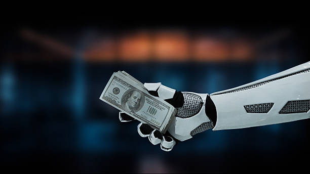 istock Futuristic Robot Hand Holding Stack of Dollar Bills in a High-Tech Environment with Blurred Background and Soft Lighting Effects 2215272922