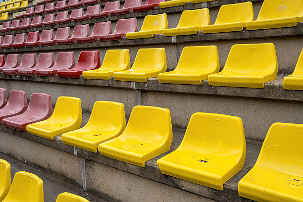 istock Yellow and red plastic seats 2215284089