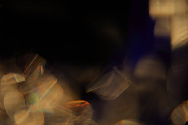 istock Abstract light leaks on black background with copy space. Studio lens flare bokeh effect. 2215286706