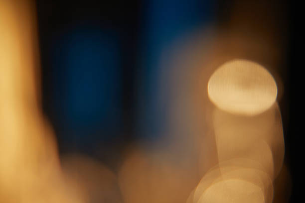istock Abstract light leaks on black background with copy space. Studio lens flare bokeh effect. 2215286836