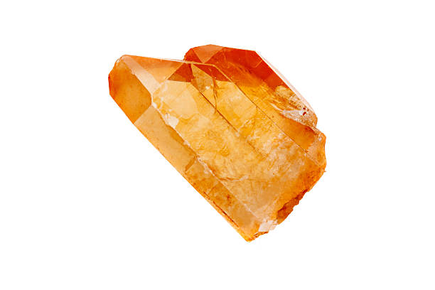 A miner carefully holds a calcite rock, bright and crystalline. The light reflects on its facets, revealing its natural beauty and the miner's skill in his work, Segovia -Spain.